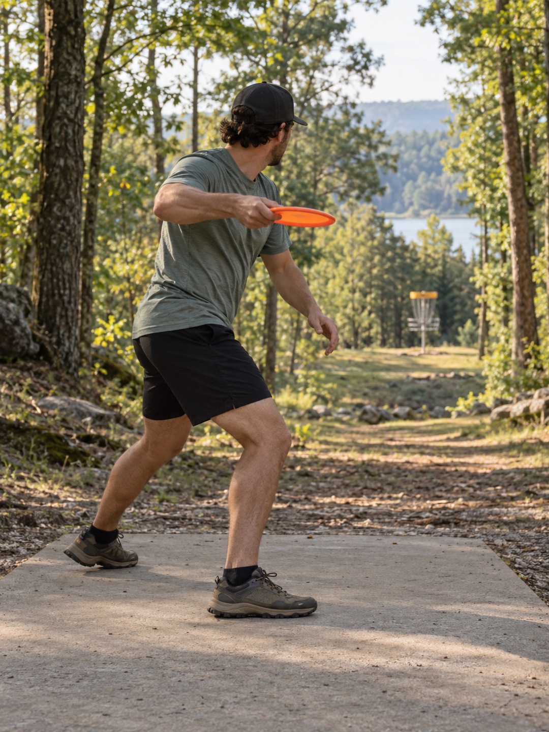Illustrative scene of an adult disc golfer preparing a backhand throw